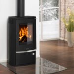 Justus Reno R Kaminofen – 6 kW Dauerbrandofen mit Natursteinverkleidung & Scheibenspülung